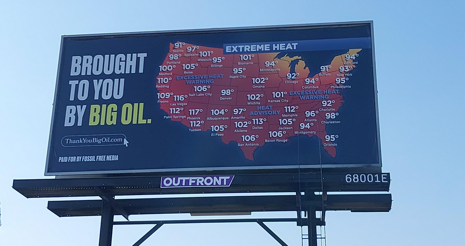 As billboards call out Big Oil for causing extreme weather, Exxon says climate targets “will fail”
